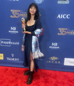 Rebecca D. Nie at an red carpet award ceremony